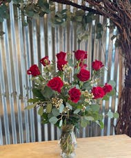 Dozen Red Roses arrangement with filler