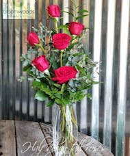 Tall half dozen red rose arrangement